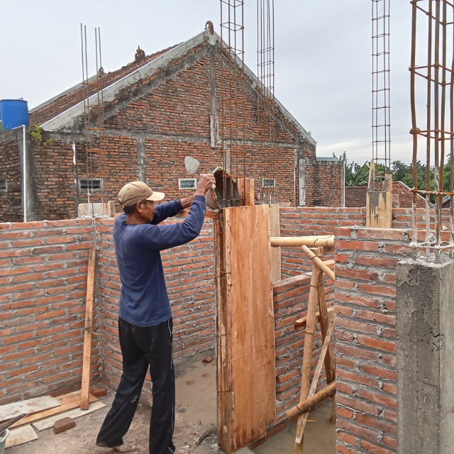 Masonry Contractor Preparing Invoice